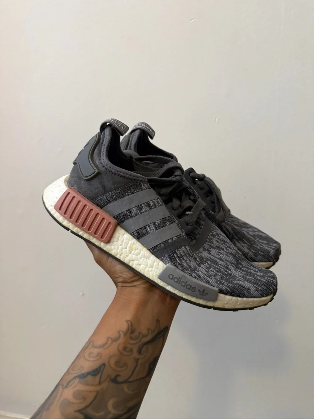 adidas Women’s Black/Grey Knit NMD_R1 Sneakers with Rose Accent